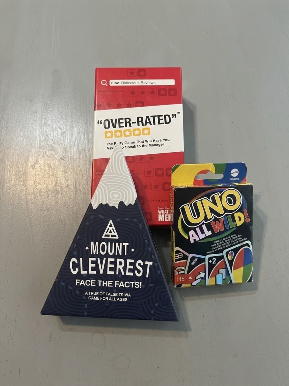 Party & Trivia Game Bundle - OVER-RATED, Mount Cleverest & UNO All Wild!